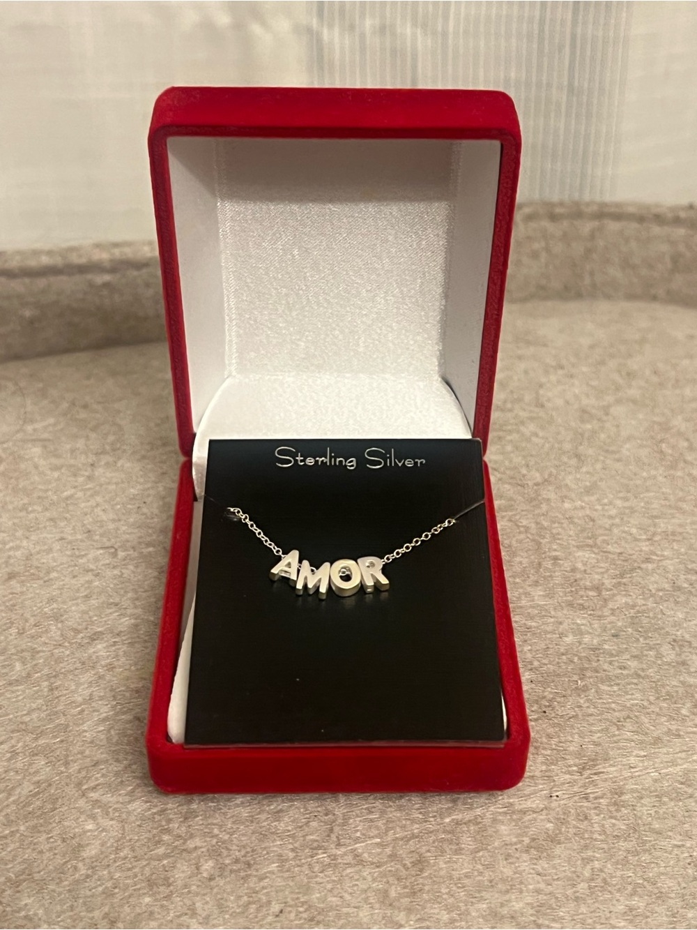 Brand new in packaging “AMOR” sterling silver necklace! Originally $60
